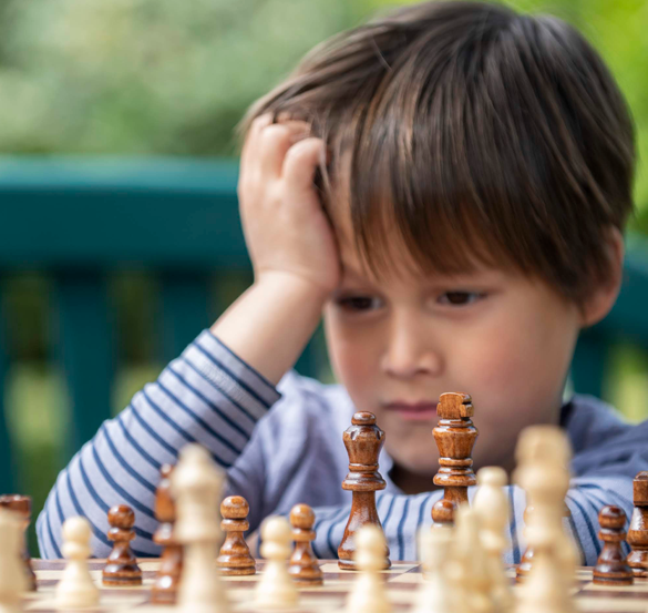 boy playing chess